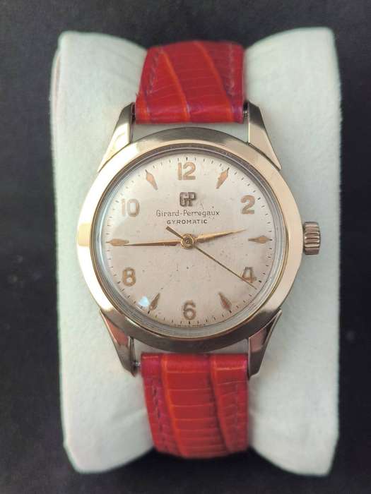 A very Rare 1950s Girard Perregaux Gyromatic with a solid gold bezel.