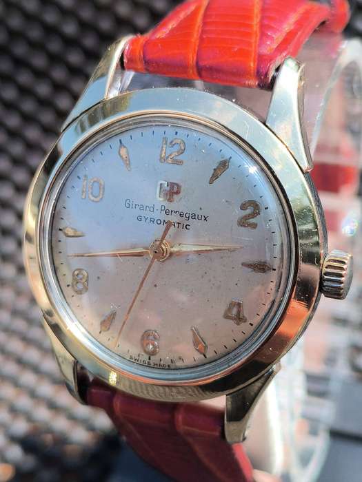 A very Rare 1950s Girard Perregaux Gyromatic with a solid gold bezel.