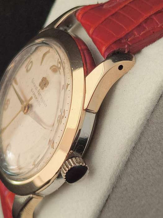 A very Rare 1950s Girard Perregaux Gyromatic with a solid gold bezel.
