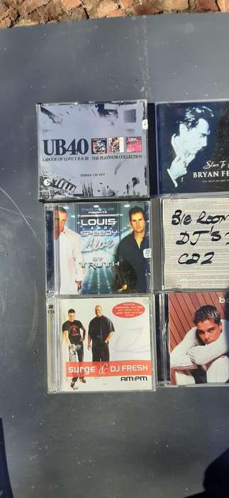 Variety of 12 music cd's listed in description