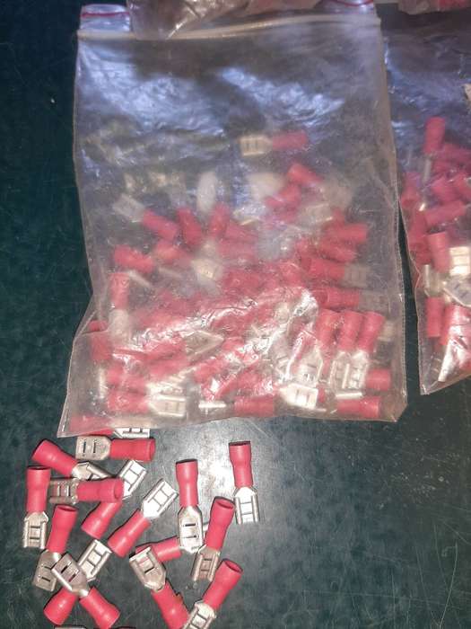 Electrical crimp connectors and two boxes of small bolts. One price.