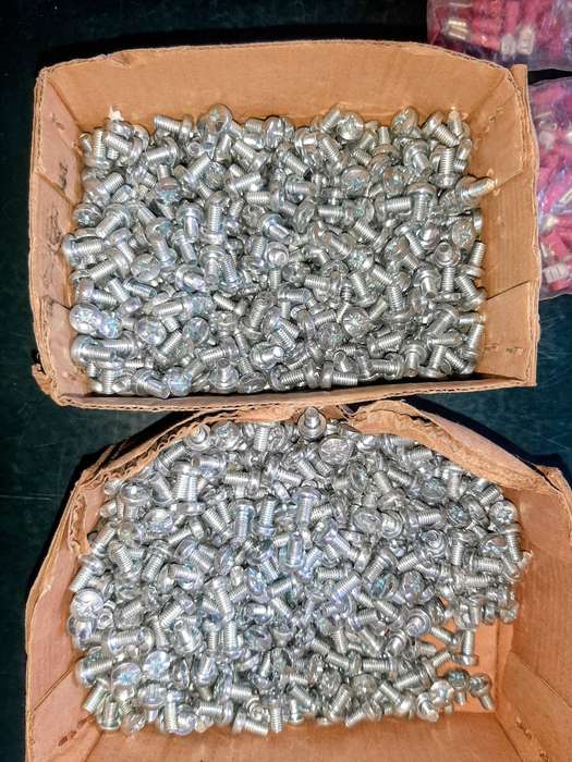Electrical crimp connectors and two boxes of small bolts. One price.