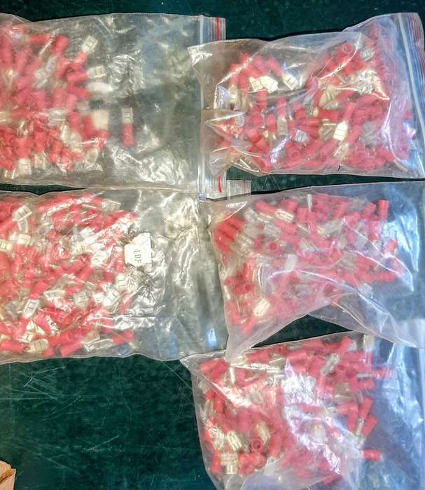 Electrical crimp connectors and two boxes of small bolts. One price.