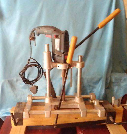 LOCK MORTICER WITH BOSCH DRILL ON STAND