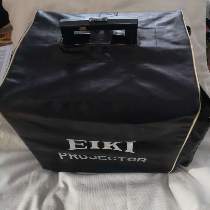 EIKI Japan NT-1 16 mm Film & Sound Projector- Reels and Dust Cover Included