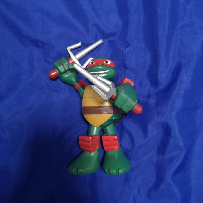 Teenage Mutant Ninja Turtle Action Figure Raphael Moving Arms - VIACOM Intl