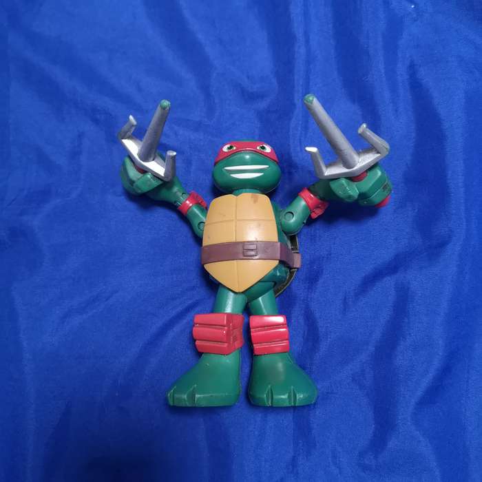 Teenage Mutant Ninja Turtle Action Figure Raphael Moving Arms - VIACOM Intl
