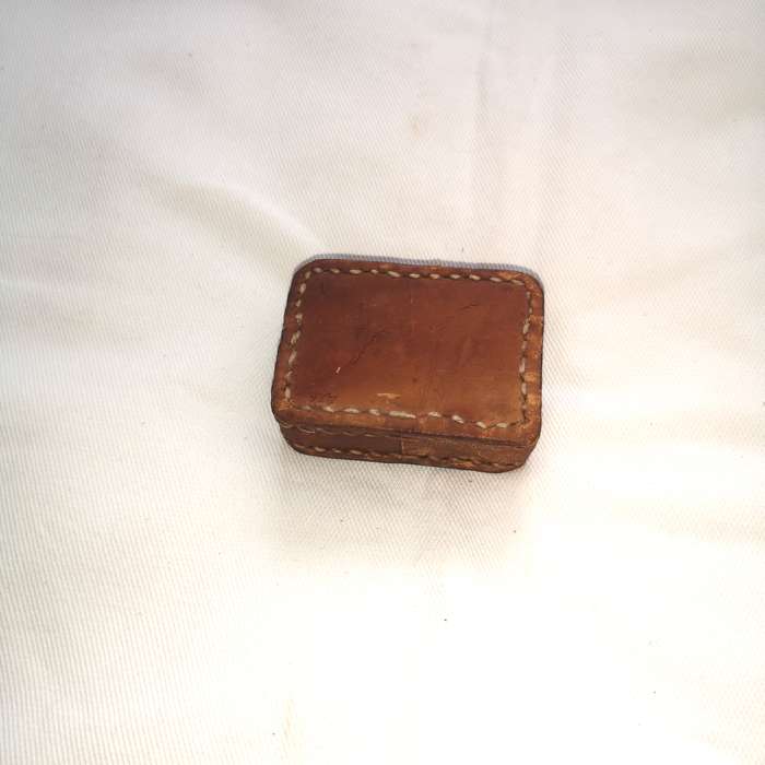 Iron block encased in thick leather- Vintage