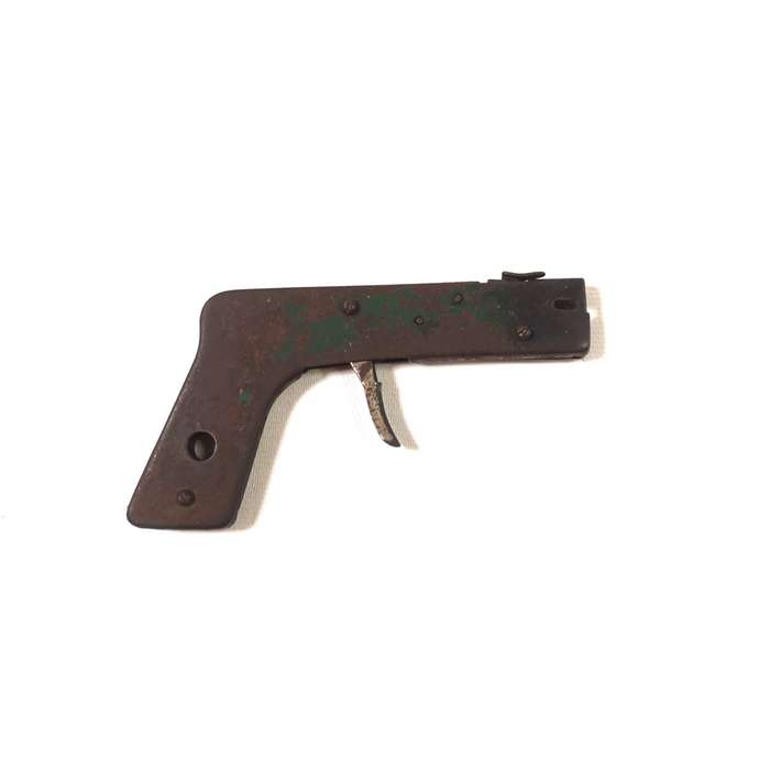 A nice old vintage flint lighter for gas stoves in the shape of a pistol with trigger action