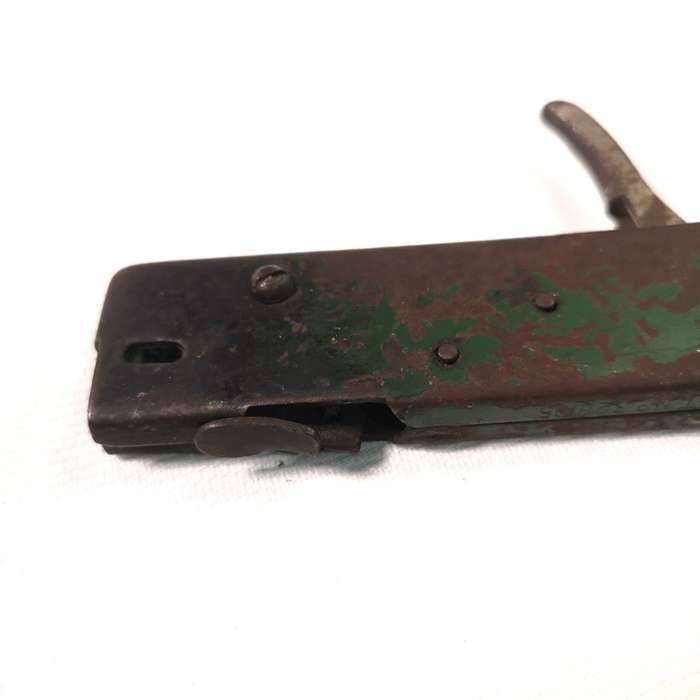 A nice old vintage flint lighter for gas stoves in the shape of a pistol with trigger action