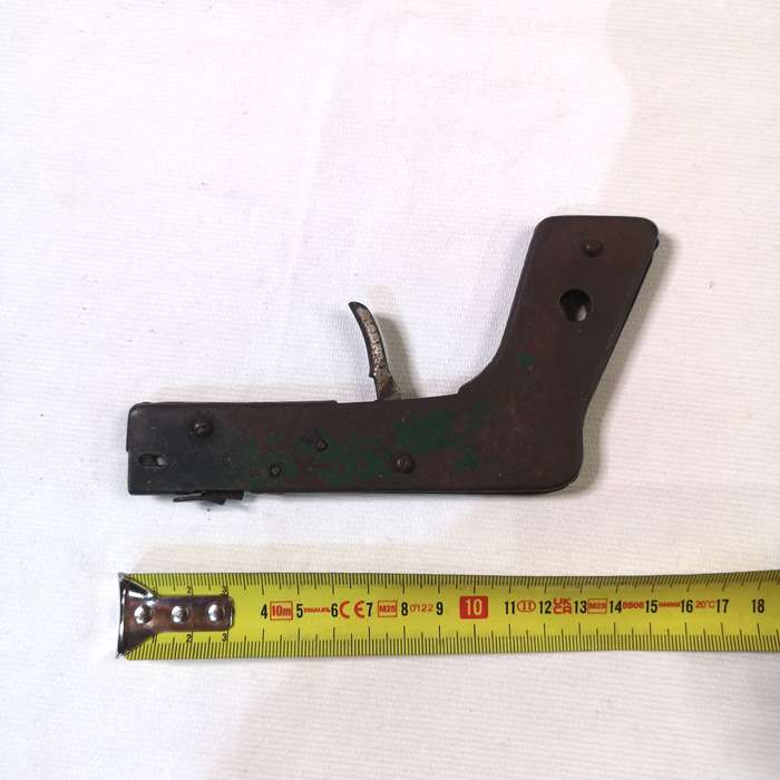 A nice old vintage flint lighter for gas stoves in the shape of a pistol with trigger action