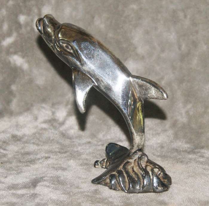 Vintage silver clad dolphin figurine