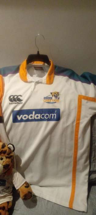 RARE SIGNED CHEETAH RUGBY MEMORABILIA. GYSIE AND RUAN PIENAAR.FATHER AND SON RUGBY LEGENDS..