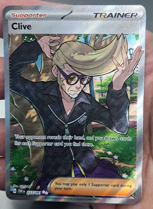 Pokemon Trading Cards - Clive - 227/091 - Illustration Rare - Paldean Fates - NM