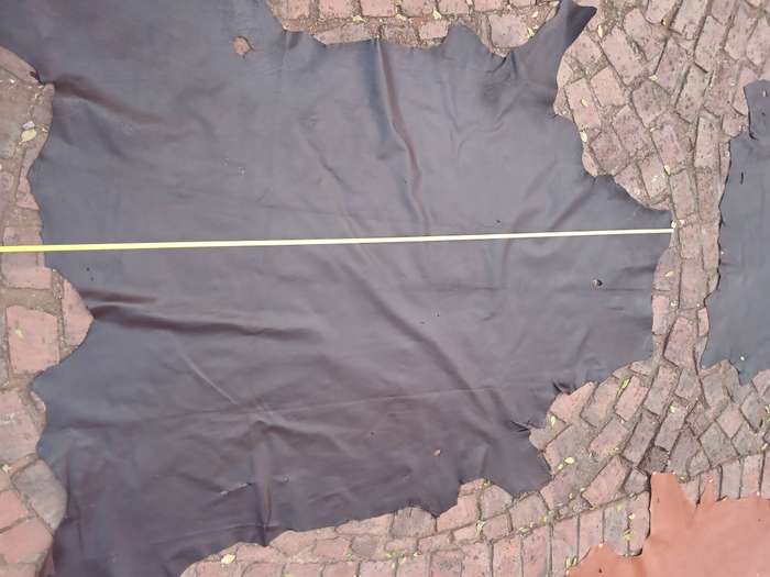 Dark brown leather cow hide