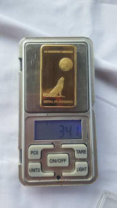 ONE TROY OUNCE 100 MILLS .999 Fine Gold glad bar up for grabs