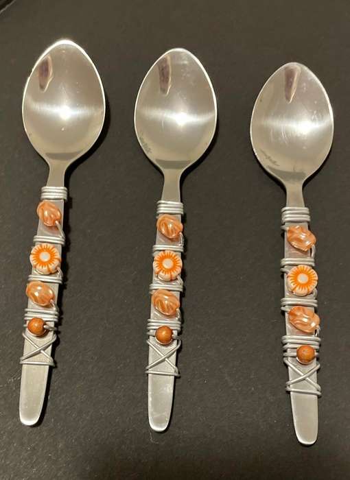 THREE BEAUTIFULLY DECORATED TEASPOONS - STAINLESS STEEL - CORAL COLOURS