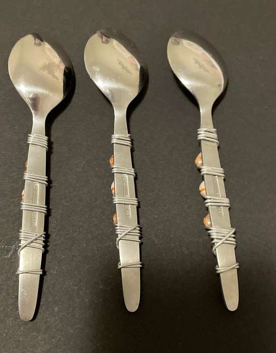 THREE BEAUTIFULLY DECORATED TEASPOONS - STAINLESS STEEL - CORAL COLOURS