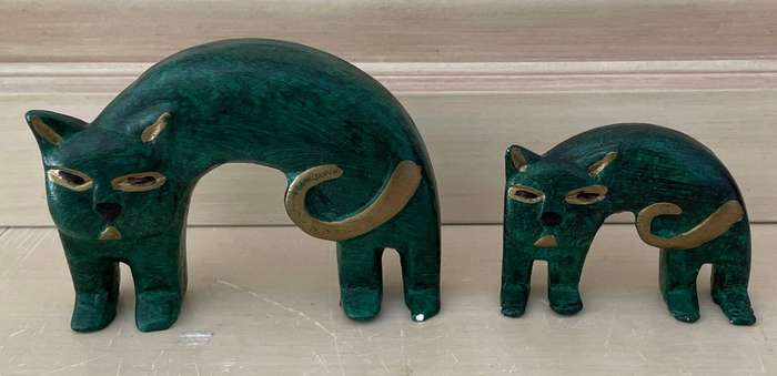 Two Delightful Ceramic Stylized Cats in Emerald and Gold colour. R60 for the pair!