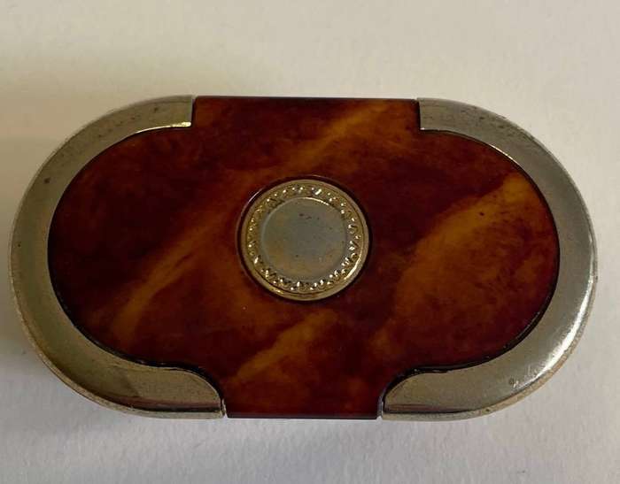 Vintage "Tortoiseshell" pillbox, with gold coloured base and decoration.