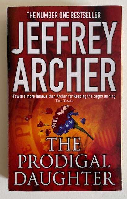 JEFFREY ARCHER - THE PRODIGAL DAUGHTER - BESTSELLER!  Pan Books 2004 - 464 pages