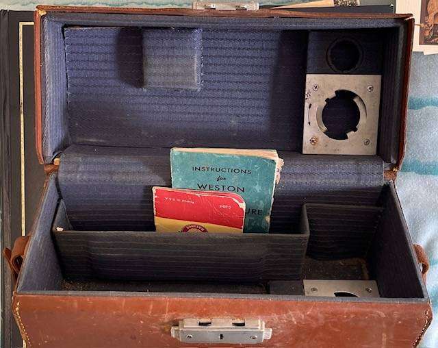 VINTAGE KODAK 16mm CINE CAMERA WITH ORIGINAL LEATHER CARRY CASE, WESTON MASTER II LIGHT METER & BOOK