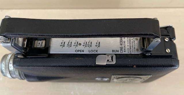 VINTAGE KODAK 16mm CINE CAMERA WITH ORIGINAL LEATHER CARRY CASE, WESTON MASTER II LIGHT METER & BOOK