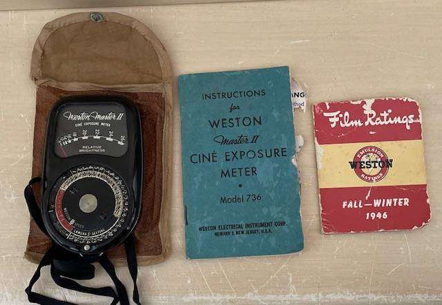 VINTAGE KODAK 16mm CINE CAMERA WITH ORIGINAL LEATHER CARRY CASE, WESTON MASTER II LIGHT METER & BOOK