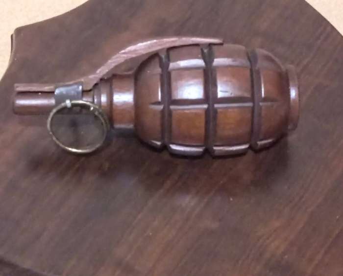 1 of a kind. Unique HardWood Hand Carved Hand Grenade Mounted on HardWood Shield.