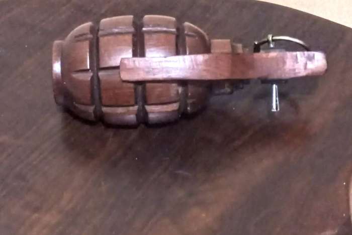 1 of a kind. Unique HardWood Hand Carved Hand Grenade Mounted on HardWood Shield.