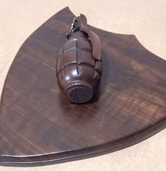 1 of a kind. Unique HardWood Hand Carved Hand Grenade Mounted on HardWood Shield.