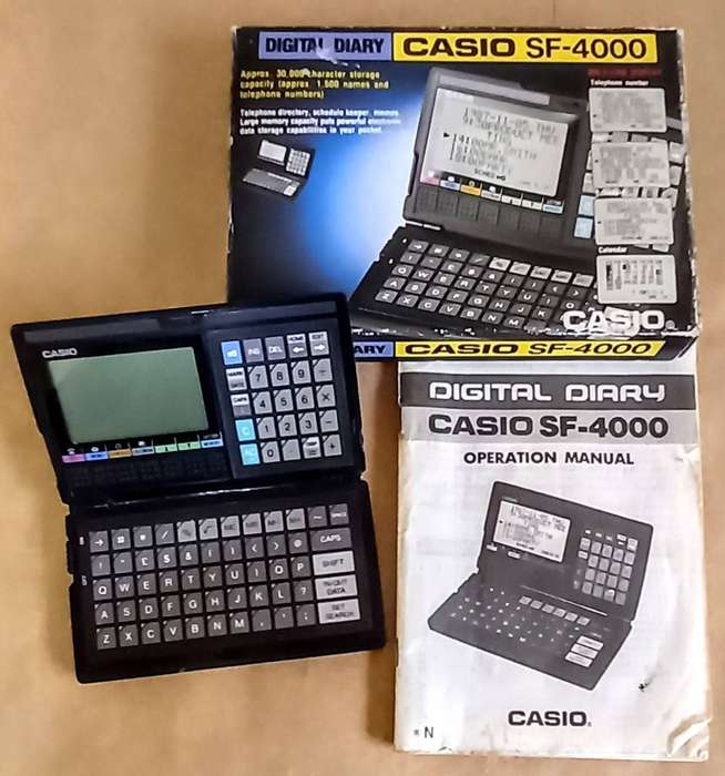 Vintage Casio SF - 4000 Digital Diary in Working Condition.