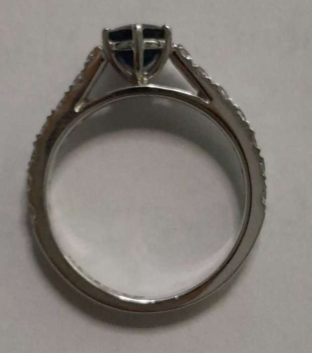 18 carat white gold diamond and blue sapphire ring