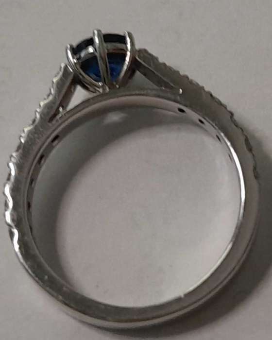 18 carat white gold diamond and blue sapphire ring