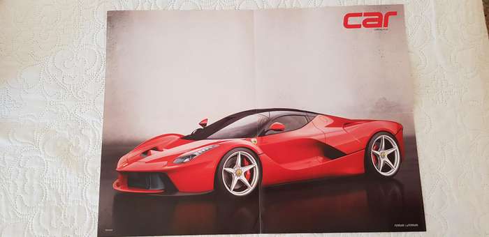 EIGHT LARGE MOTORCAR POSTERS OF POPULAR SPORTS CARS OF RECENT YEARS.