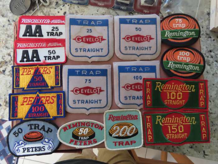 Shooting -Trap Shooting - 15 Cloth Badges Remington, Winchester, Peters, and Gevelot