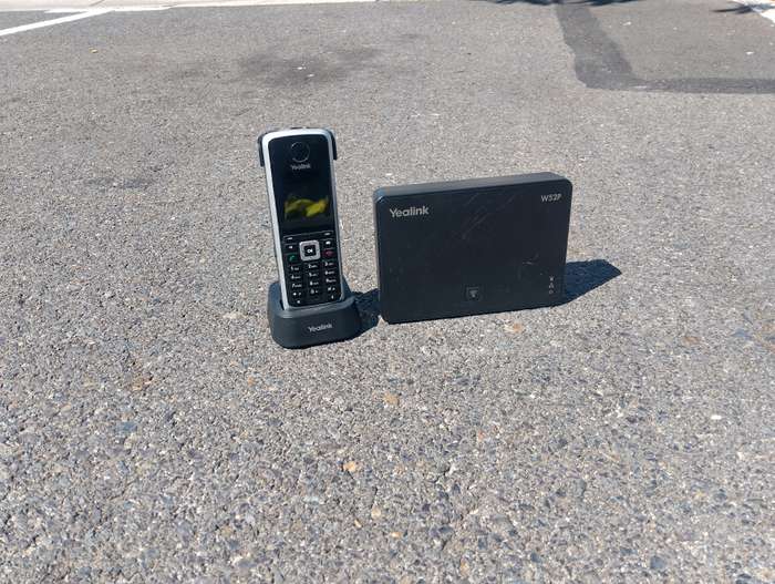 Yealink W52P Cordless phone with base, chargers, and Dect cordless handset