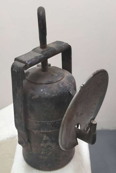 Vintage carbide lamp with reflector