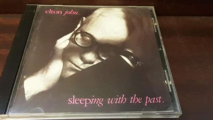 CD music  :  Elton John , sleeping with the past