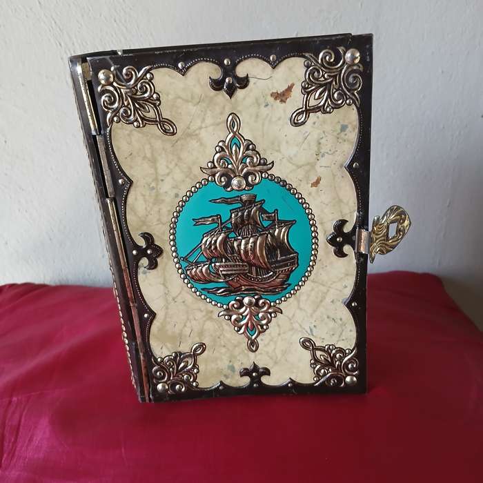 Vintage Book-shaped tin box with embossed sailing ship, treasure chest