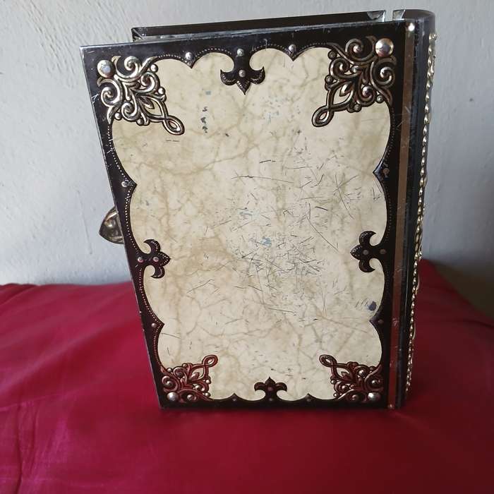 Vintage Book-shaped tin box with embossed sailing ship, treasure chest