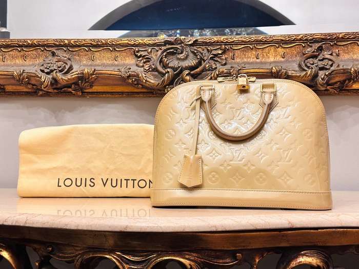Louis Vuitton Iconic Alma Monogram Signature Collection Handbag
