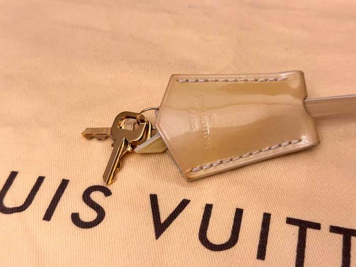Louis Vuitton Iconic Alma Monogram Signature Collection Handbag