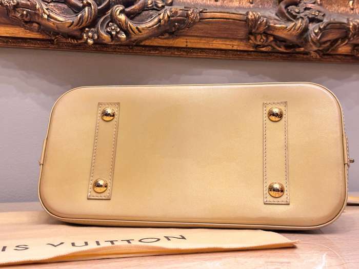 Louis Vuitton Iconic Alma Monogram Signature Collection Handbag