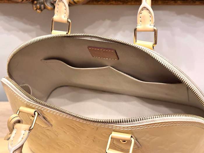 Louis Vuitton Iconic Alma Monogram Signature Collection Handbag