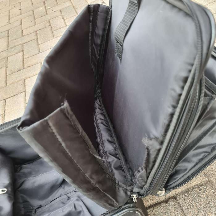 Ricardo Leather Carry-On Travel Bag with Rollers