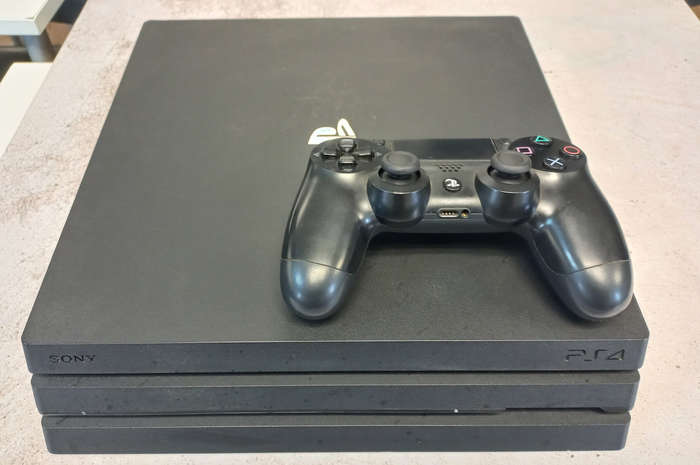Sony PlayStation 4 Pro Console + 2 Games