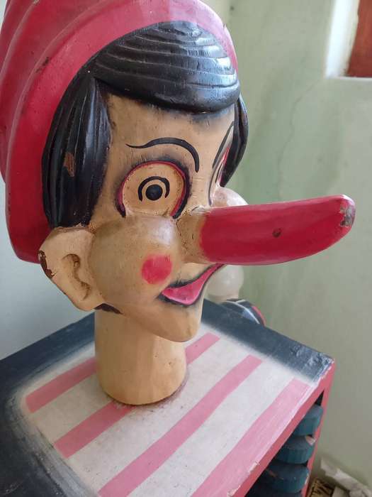 Vintage Pinocchio-handcarved cd stand