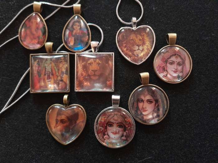 Krishna pendant on silver chain Assorted