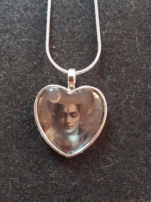 Krishna pendant on silver chain Assorted